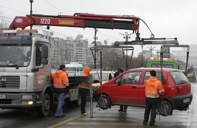 Şoferi, arătaţi hibele din noul regulament de ridicare a maşinilor, supus dezbaterii publice