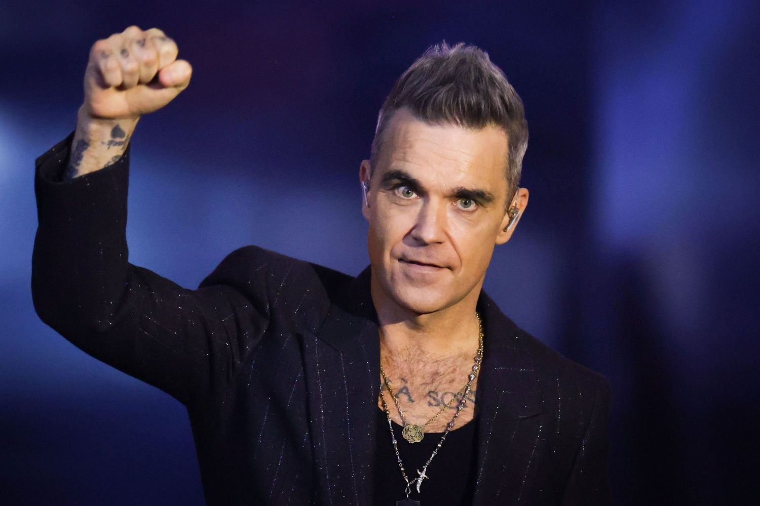 Robbie Williams a depăşit recordul trupei The Beatles în topurile din Marea Britanie