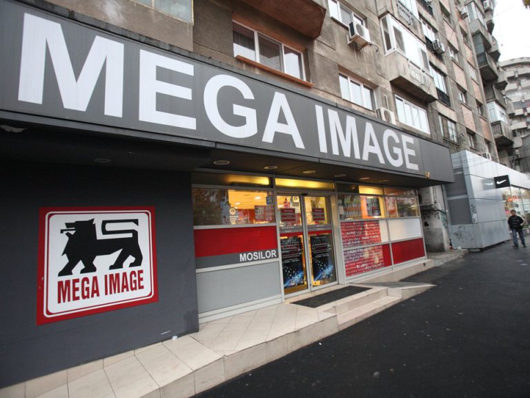 Straniu: De ce într-un magazin Mega Image o sticlă de lapte Zuzu costă 9,49 lei, iar în altul, apropiat, 10,09 lei?