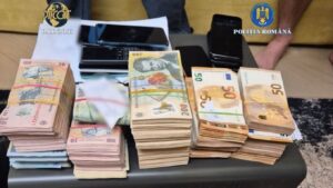 Platformă online pentru crime la comandă, destructurată de DIICOT. Sume uriașe de bani descoperite la percheziții