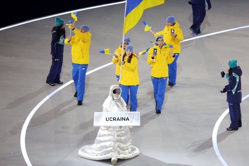  O rusoaică a purtat pancarta cu numele Ucrainei la ceremonia de deschidere a JO de iarnă. „Când mergi alături de aceşti oameni, îţi dai seama că au tot dreptul să simtă ură faţă de orice rus”